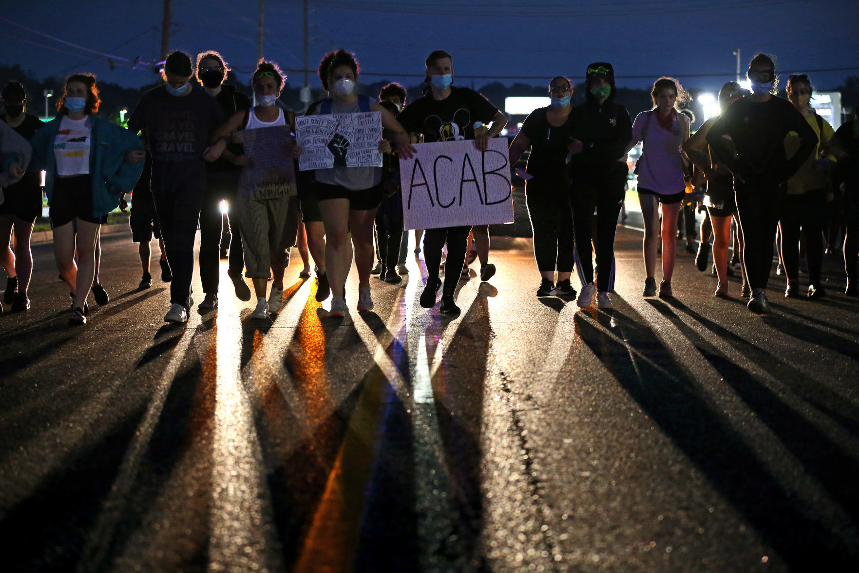 Protesters push for Florissant detective to be fired